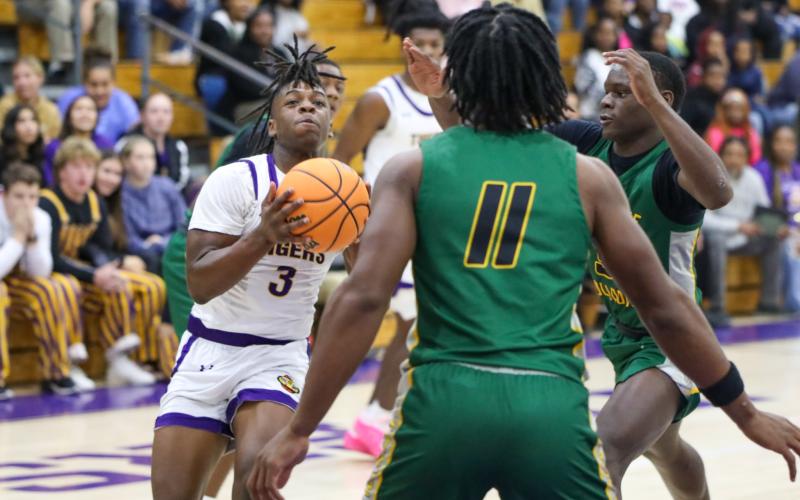 Columbia guard Zamarion Jones drives to the basket against Suwannee on Nov. 28, 2023. (BRENT KUYKENDALL/Lake City Reporter)