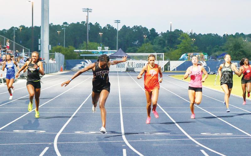 Columbia runner J'Liyn Smith set a new school record in 400m to win the Region 1-3A title. (FILE)