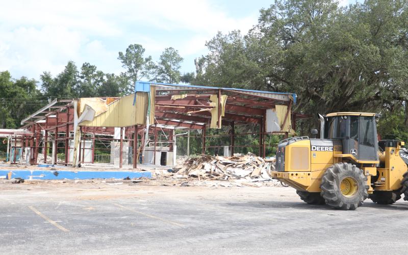 The old I-75 Autos building is being demolished along Duval Street (U.S. Highway 90). A Wawa convenience store is planned for the site, although no building permit has been applied for yet through the City of Lake City. (MORGAN MCMULLEN/Lake City Reporter)