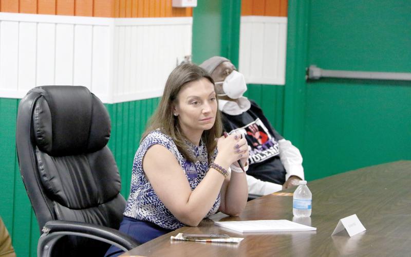 Nikki Fried, who was running for governor, listens to Columbia County residents during a ‘Summer Fest’ rally at Richardson Community Center in 2022. Lawrence Davis, who helped set up that event, is organizing a candidate forum day at New Mt. Pisgah AME Church on Saturday. All local candidates have been invited to attend. (FILE)