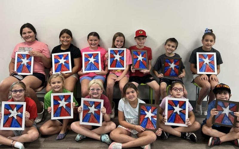 Lafayette 4-H members made stained glass windows during Camp USA. (COURTESY)