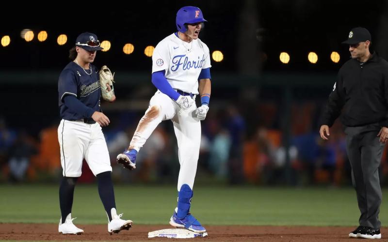 Florida’s Tyler Shelnut, a former Fort White High star, gestures after a hit this spring with the Gators. Shelnut is awaiting a phone call this weekend of early next week letting him know he’s been taken in the MLB draft. (MADDIE WASHBURN/UF Athletics)