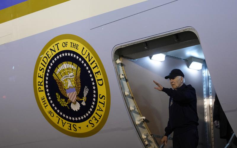 President Joe Biden steps off of Air Force One upon arrival at Dover Air Force Base in Dover, Delaware, on Wednesday. Biden tested positive for covid-19 with mild symptoms that day. (KENT NISHIMURA/AFP via Getty Images/TNS)