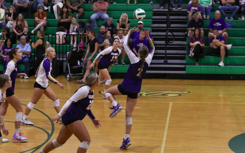 Columbia setter Mylie Fernandez (7) passes to a teammate during a match against Suwannee on Aug. 20. (BRENT KUYKENDALL/Lake City Reporter)