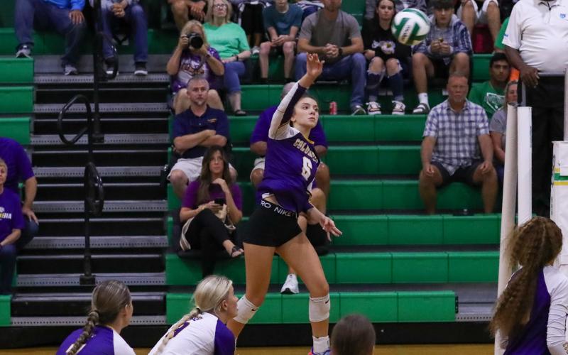 Columbia hitter Sinei Wood sends a shot over the net during Tuesday's match against Suwannee. (BRENT KUYKEDALL/Lake City Reporter)