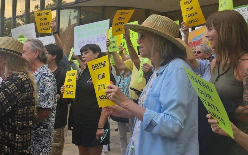 Opponents rallied Tuesday in Tallahassee against a plan to put golf courses, lodges and pickleball courts in state parks. (JIM TURNER/News Service of Florida)