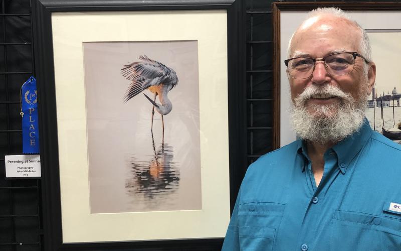 John Middleton, of Mayo, won the Branford Camera Club’s photography contest with his entry ‘Preening at Sunrise.’ The contest entries are exhibited at the Gateway Art Gallery through August. (COURTESY)