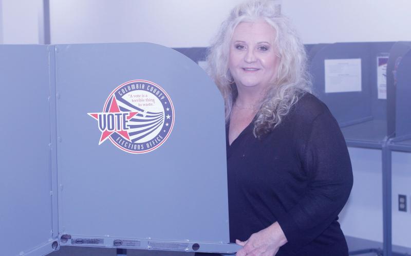 Columbia County Supervisor of Elections Tomi Brown, pictured in the voting room at the elections office, said her staff is ready for early voting, which runs through Aug. 17. (JAMIE WACHTER/Lake City Reporter)