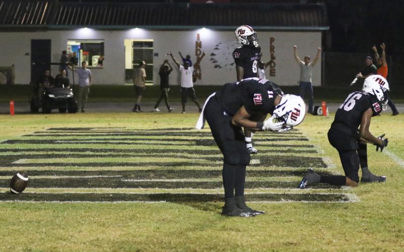 Fort White defensive back Gavin Peterson (11) reacts after Taylor County scored the game-winning touchdown in overtime on Friday. (MORGAN MCMULLEN/Lake City Reporter)