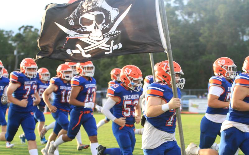 Branford takes the field prior to its game against Oak Hall on Aug. 23. (PAUL BUCHANAN/Special to the Reporter)