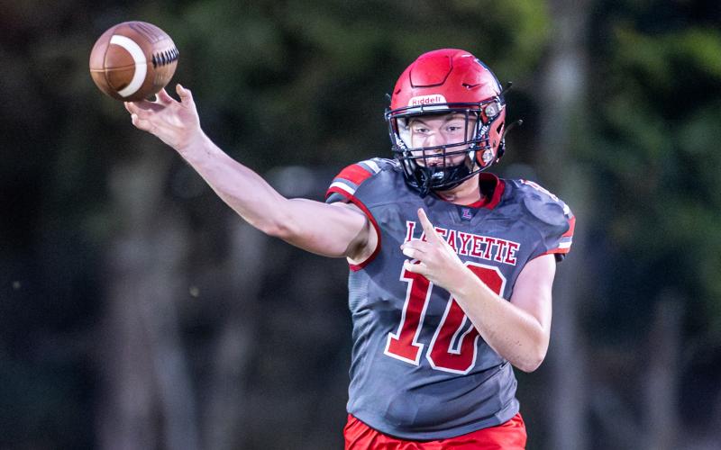 Lafayette quarterback Tucker Higginbotham threw five touchdown passes to lead the Hornets to a 38-12 win over Dixie County last Friday. (JACK HOWDESHELL/Special to the Reporter)