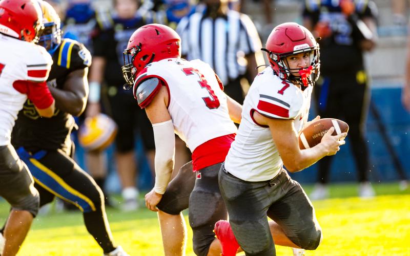 Lafayette receiver Parker Hill turns up field after taking a handoff during the Preseason Classic against Newberry on Aug. 15. (JACK HOWDESHELL/Lake City Reporter)