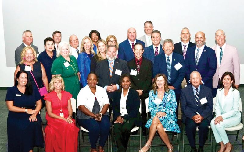 A signing ceremony was held Thursday with 23 school districts, including representatives from Columbia, Suwannee and Hamilton county districts, to launch the Space Florida Academy program. (COURTESY)