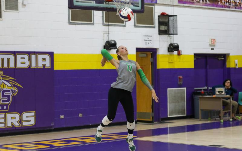 Suwannee's Paula Golub serves against Columbia on Sept. 3. (BRENT KUYKENDALL/Lake City Reporter)