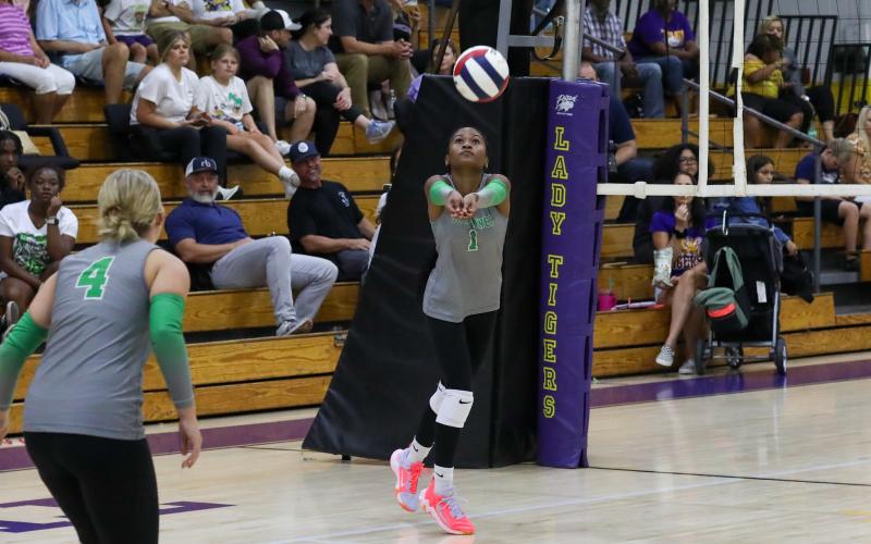 Suwannee hitter Kaleah Tucker sets up a teammate for a shot against Columbia on Sept. 3. (BRENT KUYKENDALL/Lake City Reporter)