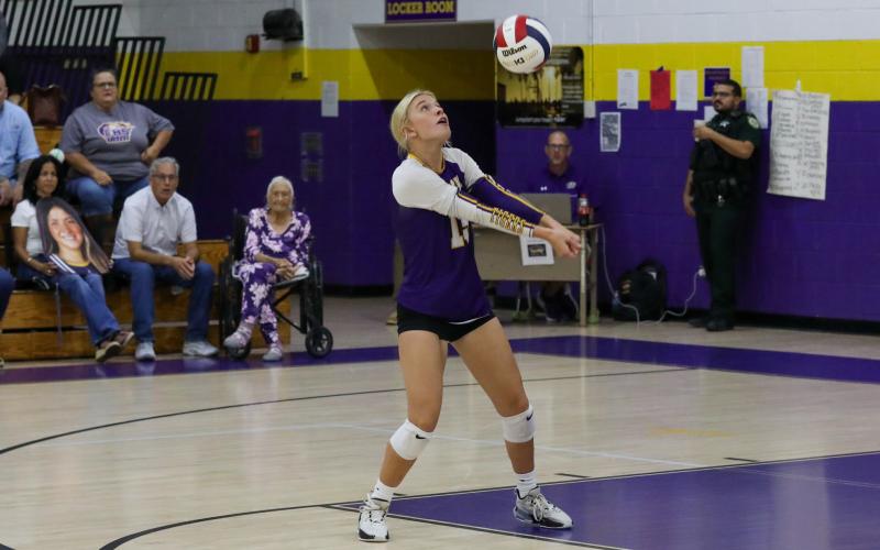 Columbia's Avery Sandlin defends a shot against Suwannee on Tuesday. (BRENT KUYKENDALL/Lake City Reporter)