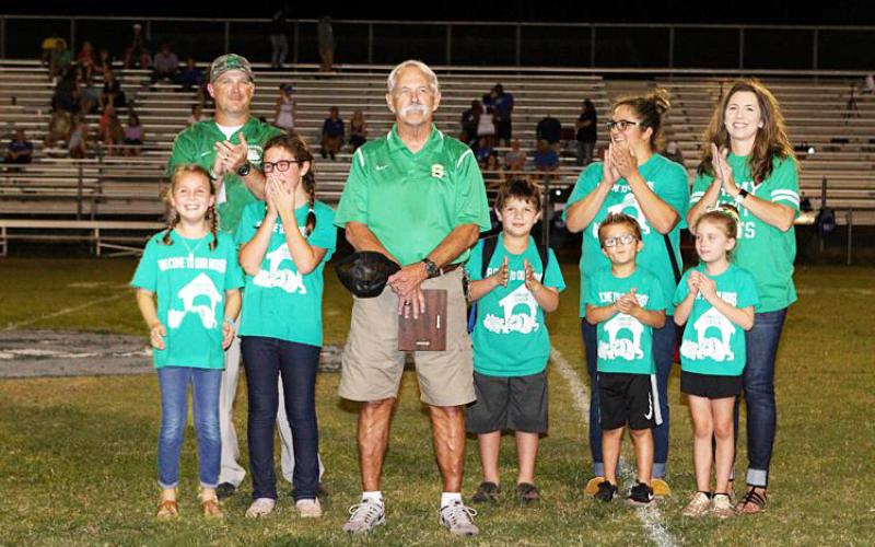 Ron Hall, fourth from left and pictured with his family, was inducted into the Suwannee Hall of Fame in 2018. (PAUL BUCHANAN/Lake City Reporter))