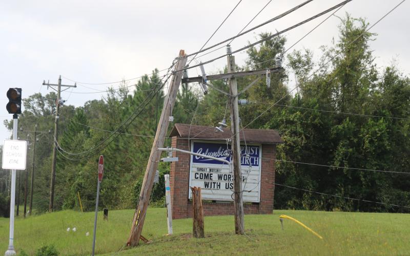 A splintered power pole sits along State Road 47 in front of Columbia City Baptist Church after Hurricane Helene passed through early Friday morning. (JAMIE WACHTER/Lake City Reporter)