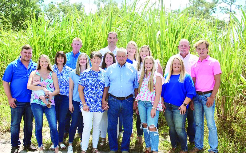 The Ash family was recently recognized as the Lafayette County Farm Bureau Farm Family of the Year. Stanley and Jeanette Ash (front middle) are surrounded by their daughters and their families: Lucas and Susan Morgan with Ryan, Kaylin, and Waylon Koon and Ashlyn Morgan. Brian, Sonya, Laura Beth, and Emma Hill; Clint, Sandy, Malah, and Pearson Bass. (COURTESY)