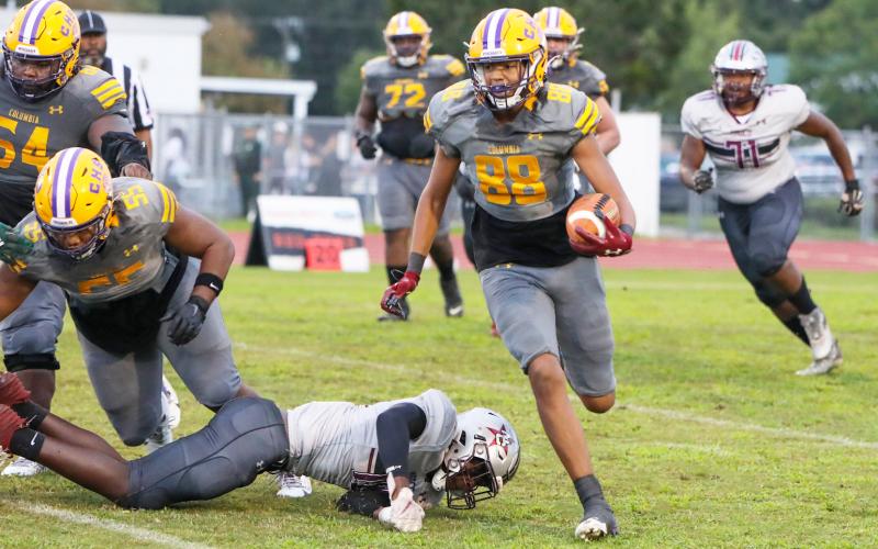 Columbia tight end Aaron Holmes (88) runs up the field after a catch against Madison County last Friday. (BRENT KUYKENDALL/Lake City Reporter)