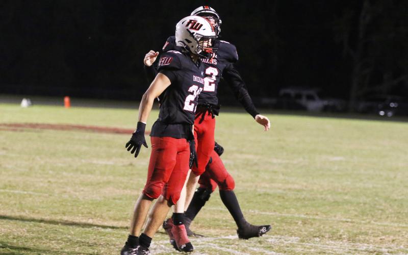 Fort White kicker Maxwell Eyjolfsson celebrates after making the go-ahead field goal against North Marion on Friday. (MORGAN MCMULLEN/Lake City Reporter)