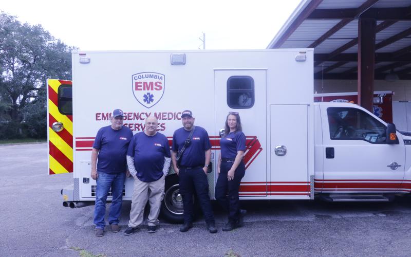 Columbia EMS, which will serve as Columbia County’s 911 emergency medical service provider starting Oct. 1, already has two trucks on the road. Among the Columbia EMS team are Toby Witt (from left), Mike Broshar, Aaron Smith and Cherie Lawrence. (JAMIE WACHTER/Lake City Reporter)