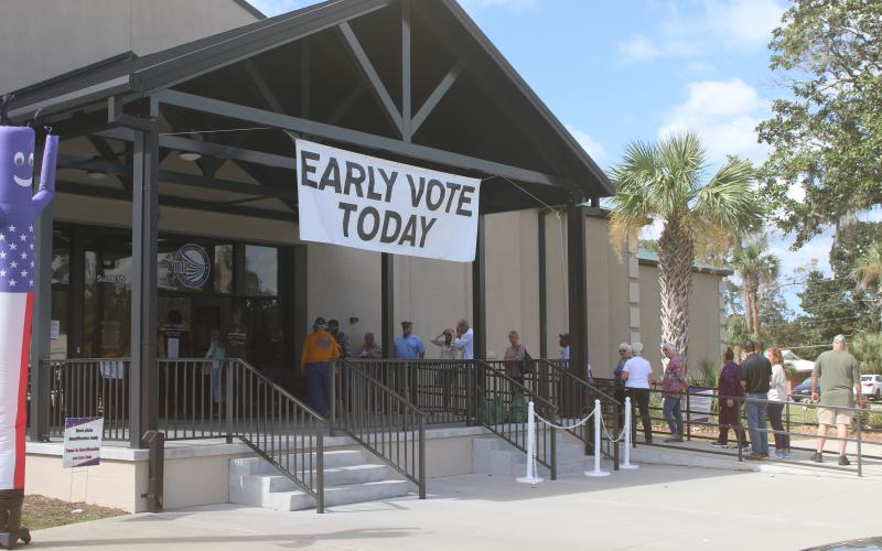 Columbia County voters wait in line last week at the Supervisor of Elections office to cast their ballots during early voting for the general election. (TONY BRITT/Lake City Reporter)