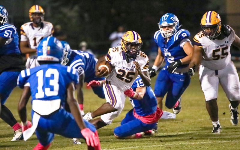 Columbia running back Jerome Horne races through the Clay defense last Friday. (BRENT KUYKENDALL/Lake City Reporter)