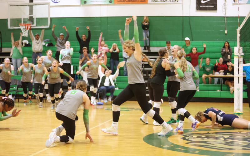 Suwannee celebrates after scoring the match-winning point against Wakulla in the fifth set of Thursday's District 2-4A championship. (PAUL BUCHANAN/Lake City Reporter)
