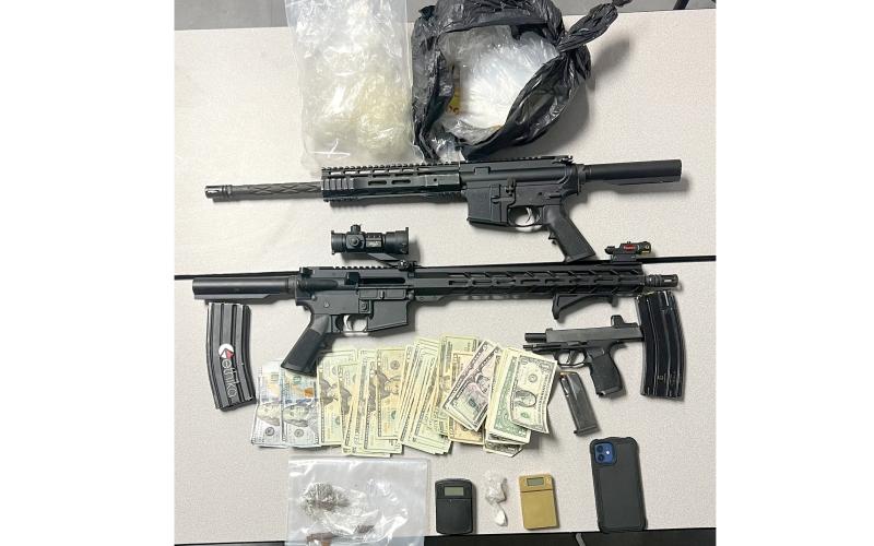 The Lake City Police Department seized firearms, drugs and drug paraphernalia out of a vehicle at the Cedar Park apartments after someone reported individuals placing the firearms into the car’s trunk. (COURTESY LAKE CITY POLICE DEPARTMENT)