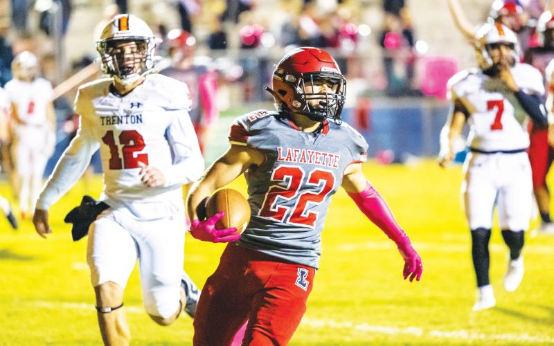 Lafayette running back Tavis Hutson scores a touchdown against Trenton on Oct. 18. (JACK HOWDESHELL/Lake City Reporter)
