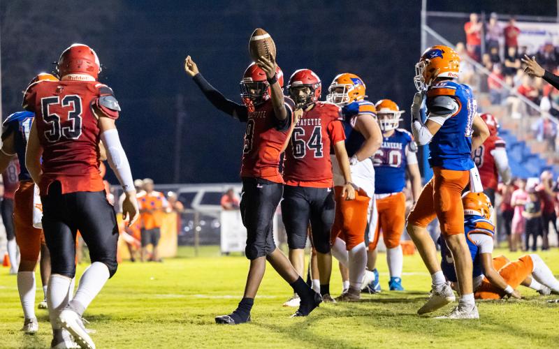 Lafayette quarterback Tywan Williamson (9) celebrates after scoring a touchdown against Branford on Monday. (JACK HOWDESHELL/Lake City Reporter)