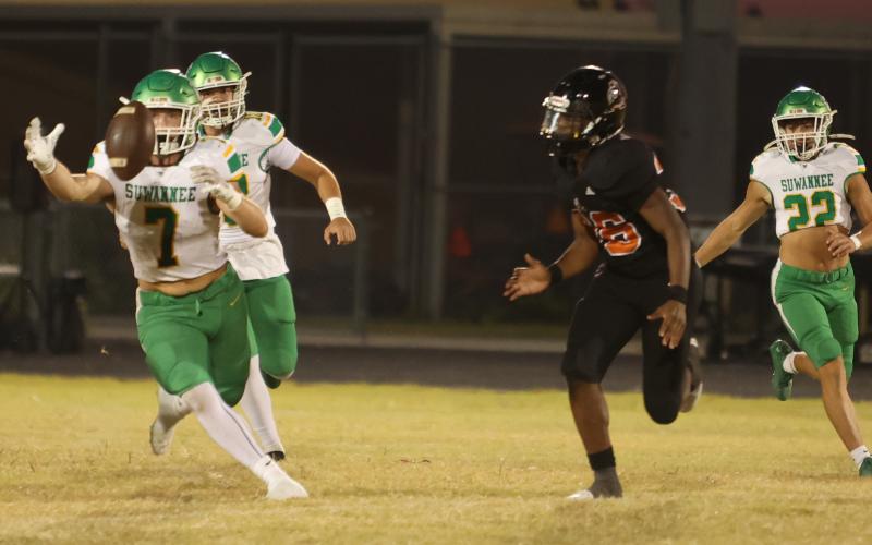 Suwannee linebacker Jace Moran recovers an onside kick against Atlantic Coast last Friday. (PAUL BUCHANAN/Lake City Reporter)