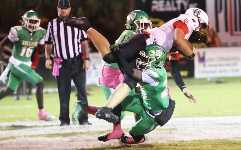 Suwannee defensive back Jeremy Webb makes a tackle against Baker County on Friday. (PAUL BUCHANAN/Lake City Reporter)