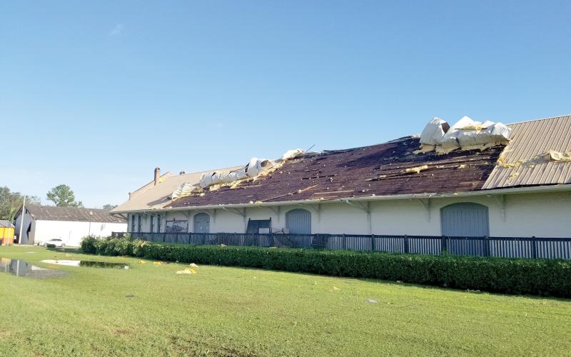 The roof on the 1903 Atlantic Coast Line Freight Station, which houses the Suwannee County Historical Museum, was peeled off during Hurricane Helene. Crews have already done a temporary fix on the roof to protect the artifacts and displays inside the museum. (COURTESY ERIC MUSGROVE)