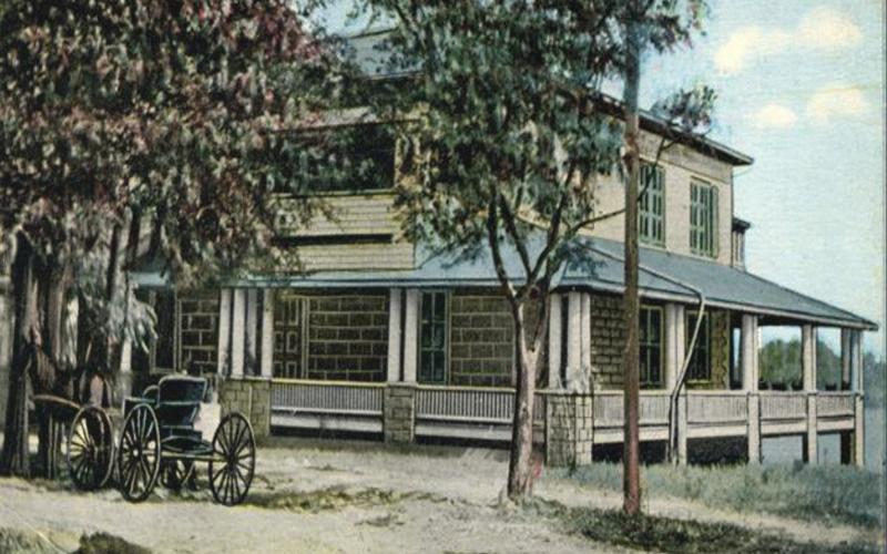 An early 20th-century photo shows the Elks lodge on the banks of Lake DeSoto in Lake City. (COURTESY)