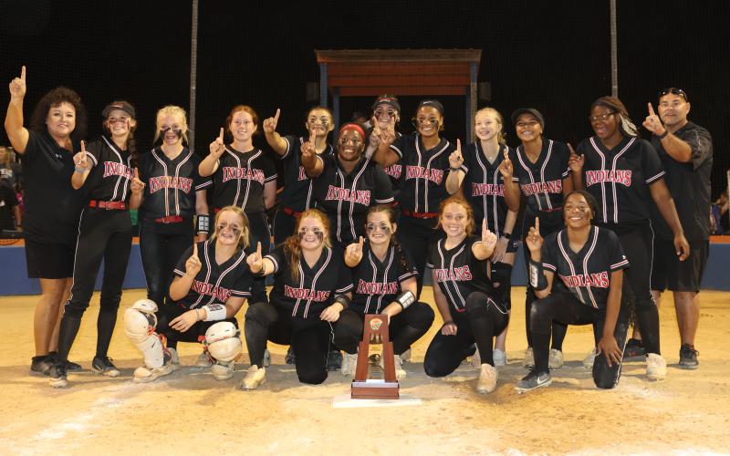 Fort White head coach Michelle Padgett (far left) and assistant coach Chad Padgett (far right) officially resigned from their positions Tuesday after 12 seasons as the helm. (FILE)