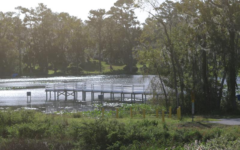 A metal pier sits on the banks of Lake Montgomery. The second phase of work at Campbell Park is expected to begin after delays caused by Hurricanes Helene and Milton. (TONY BRITT/Lake City Reporter)