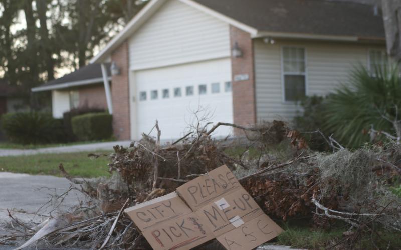 A pile of debris left over from Hurricane Helene awaits pickup. (TONY BRITT/Lake City Reporter)