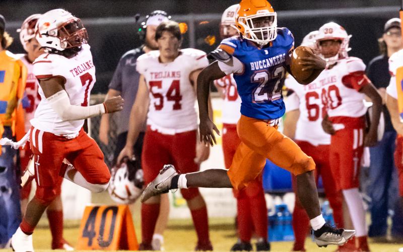 Branford running back Ollie James (22) heads to the end zone on a 65-yard touchdown run during Friday’s 39-12 win over Hamilton County. (JACK HOWDESHELL/Lake City Reporter)