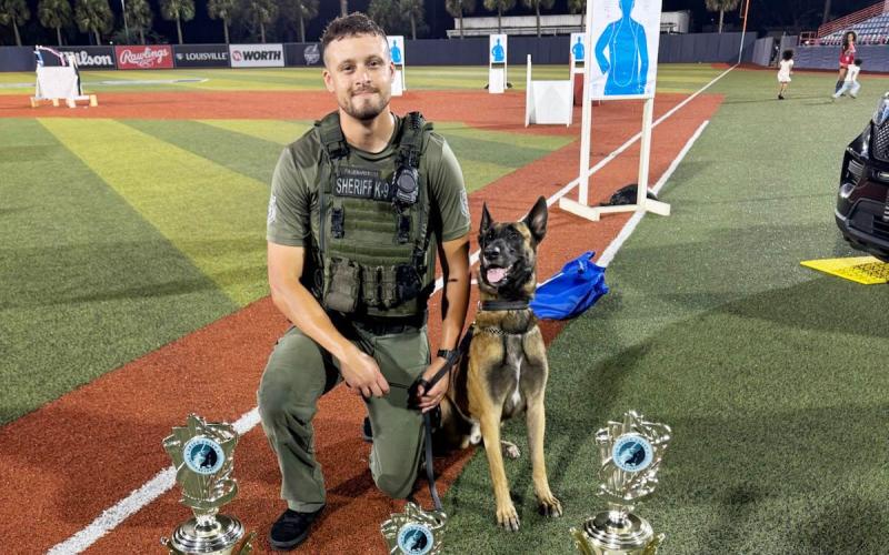 Columbia County Sheriff’s Office Sgt. Matthew Waddington and his K9 partner Cairo earned three awards at the Space Coast Police K-9 Competition on Friday in Viera. Cairo was name dthe fastest dog and the hardest dog while finishing third on the obstacle course. (COURTESY)