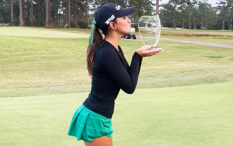 Suwannee golfer Ryan Donaldson celebrates with the Region 1-2A trophy after winning the tournament with a 2-under-69 on Tuesday. (COURTESY)