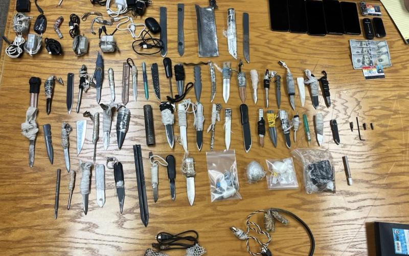 The contraband collected during an unannounced sweep at Suwannee Correctional Institution included 50 weapons as well as drugs, alcohol and phones. (COURTESY FLORIDA DEPARTMENT OF CORRECTIONS)