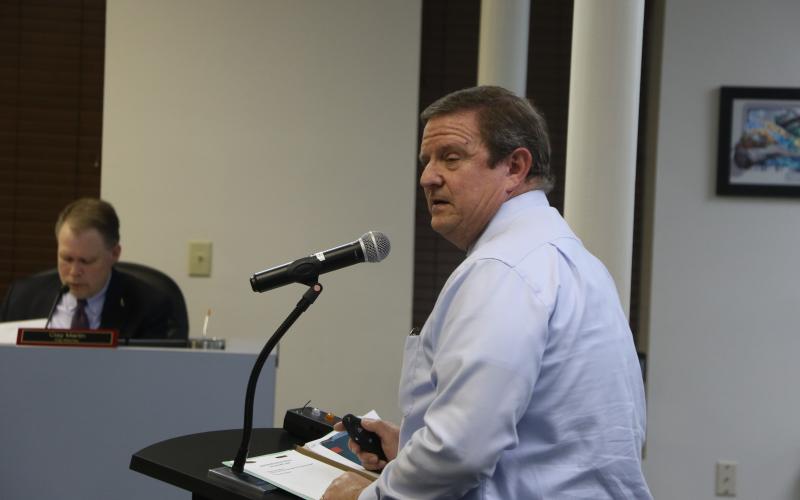 Bryan Thomas, the principle planner for the City of Lake City, talks about the land development changes requested for a property at the intersection of SW Main Boulevard and Baya Avenue. (MORGAN MCMULLEN/Lake City Reporter)