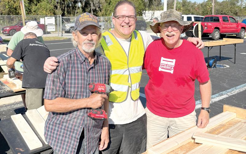 Robert Stuart (from left), Christopher Costello and Rick Fortney helped build 22 new beds for Columbia County children who don’t have one. (COURTESY)