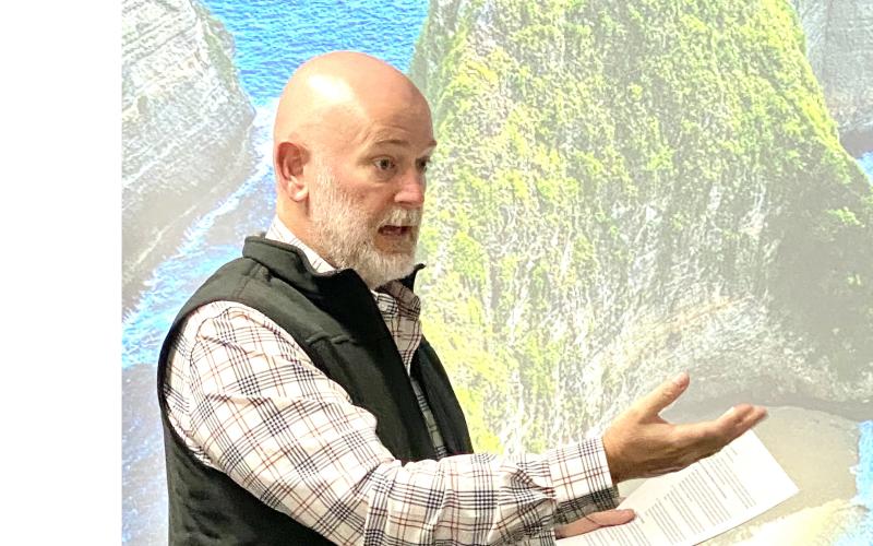 Columbia County Attorney Joel Foreman explains the details necessary to amend the FEMA-approved Hurricane cleanup contract with county commissioners Thursday. (TODD WILSON/Lake City Reporter)