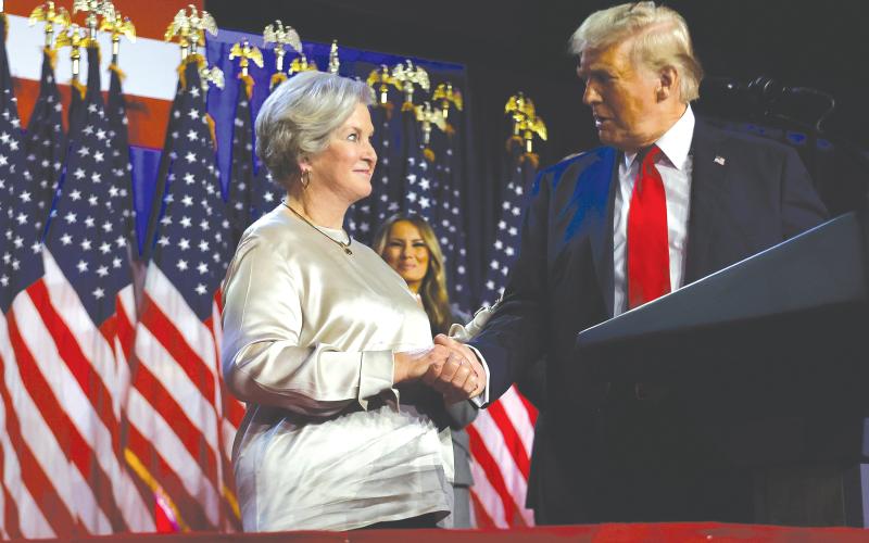 Donald Trump praises his campaign senior adviser Susie Wiles during election night. (CHIP SOMODEVILLA/Getty Images/TNS)
