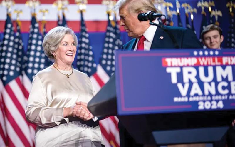 Susie Wiles speaks with Donald Trump after he was declared the winner during an election night watch party last week at the Palm Beach County Convention Center in West Palm Beach. (JABIN BOTSFORD/The Washington Post/Getty Images/MCT)