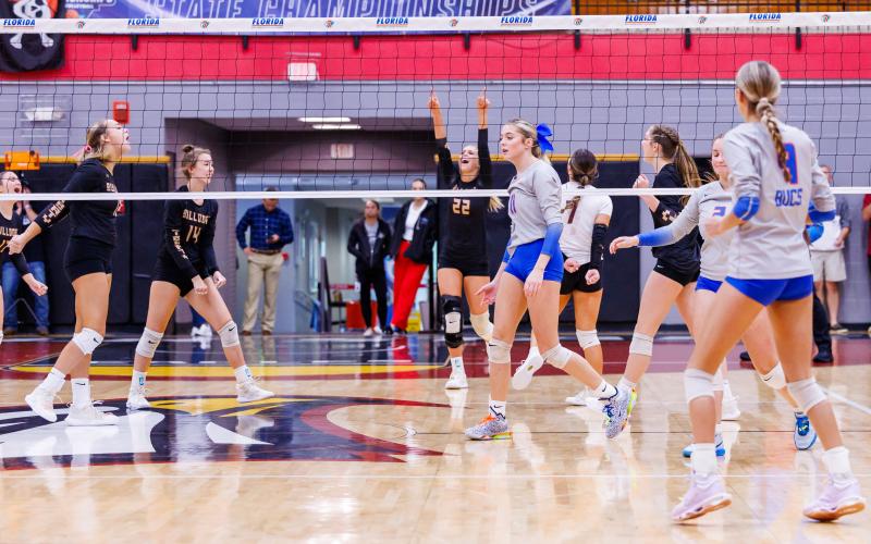 Liberty County celebrates after scoring a point against Branford during the Class Rural state championship on Wednesday. (JACK HOWDESHELL/Lake City Reporter)