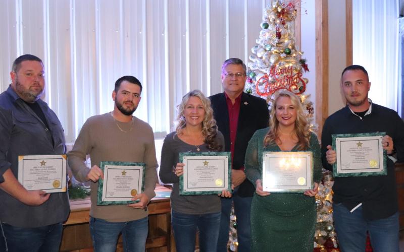 Honored for their work with the Columbia County Sheriff’s Office in 2024 at the agency’s annual Christmas party and awards ceremony were Lt. Ronnie Daniels (from left), Dale Tanksley (Detention Officer of the Year), Hope Crawford (Non-Sworn Employee of the Year), Sheriff Mark Hunter, Jennier Cason (Detective of the Year) and Michael Rooney (Deputy of the Year). Not pictured are Skip Bunner (Volunteer of the Year) and Cathy Davis, who also were recognized. (COURTESY COLUMBIA COUNTY SHERIFF'S OFFICE)
